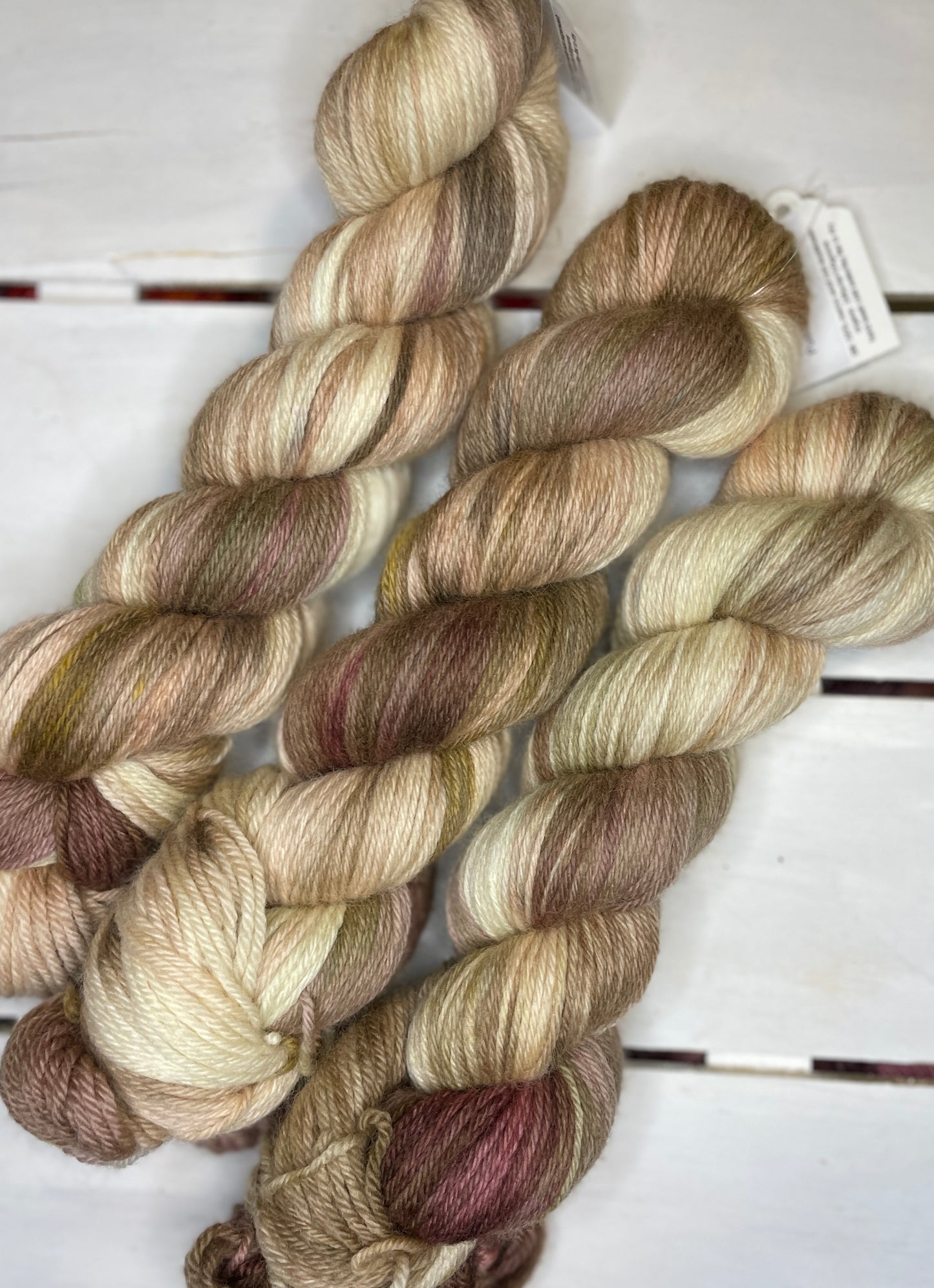 Puddle of Pooches, brown, tan, beige superwash merino wool