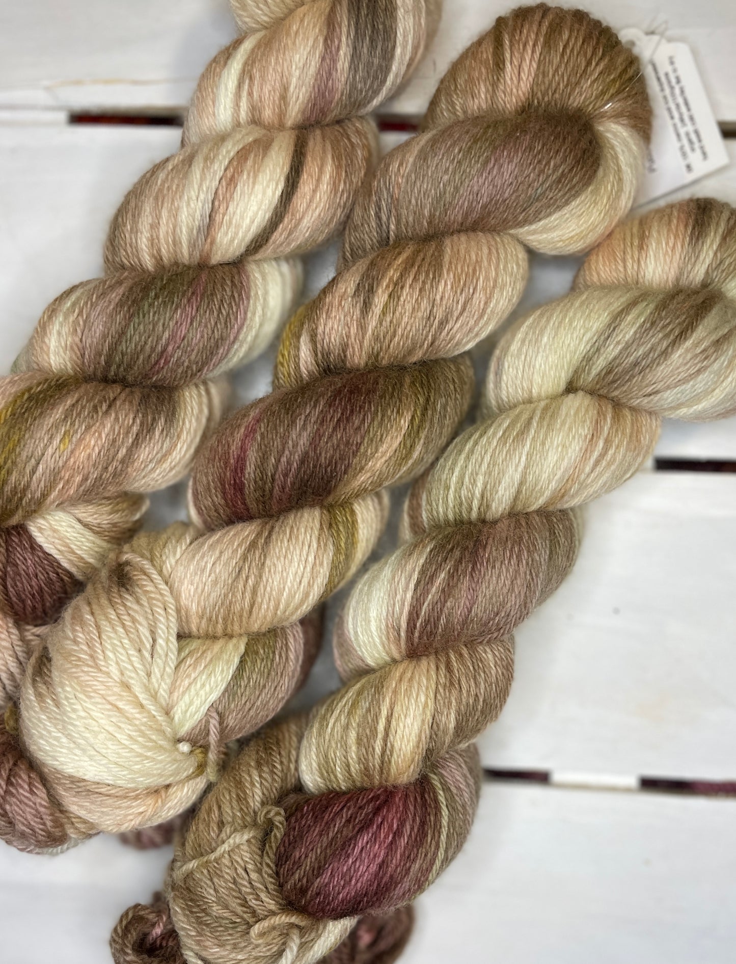 Puddle of Pooches, brown, tan, beige superwash merino wool