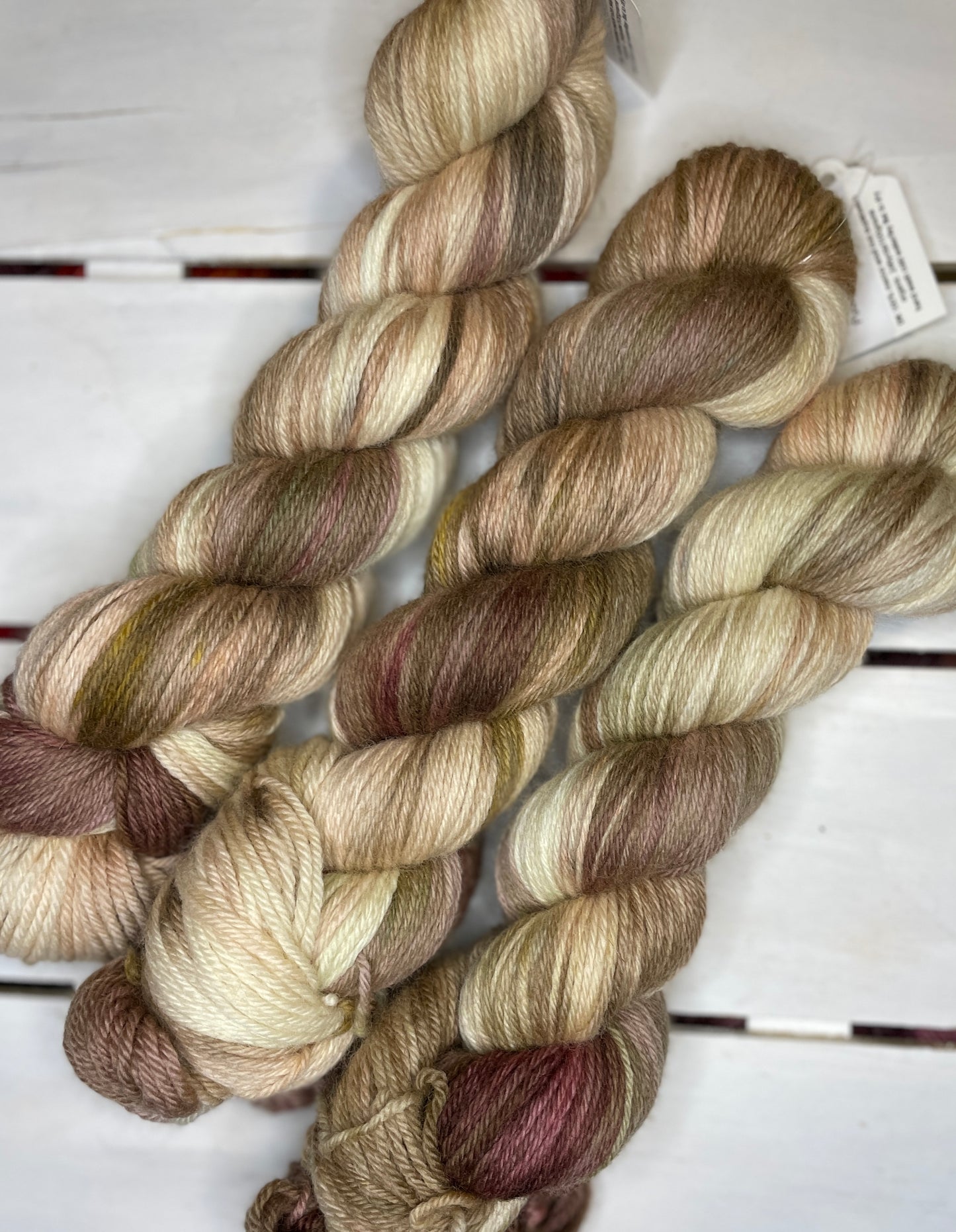 Puddle of Pooches, brown, tan, beige superwash merino wool