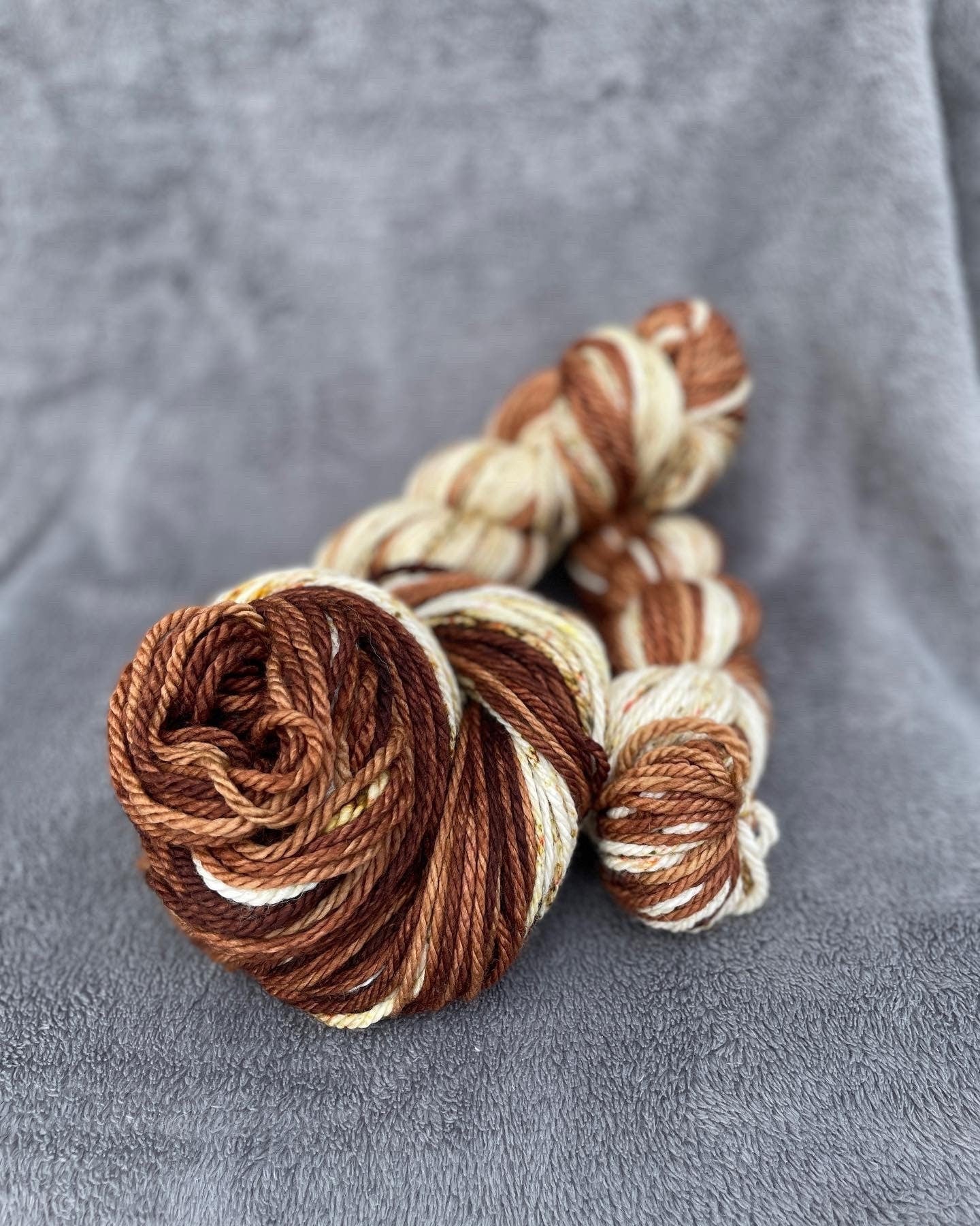 Cabin Vibes, bulky weight 100% super wash merino wool. Brown, beige golds