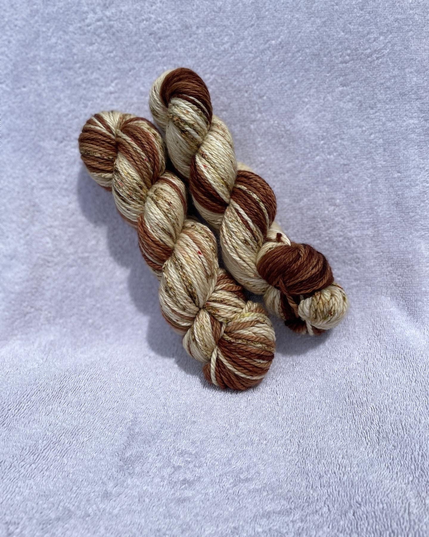 Cabin Vibes, bulky weight 100% super wash merino wool. Brown, beige golds