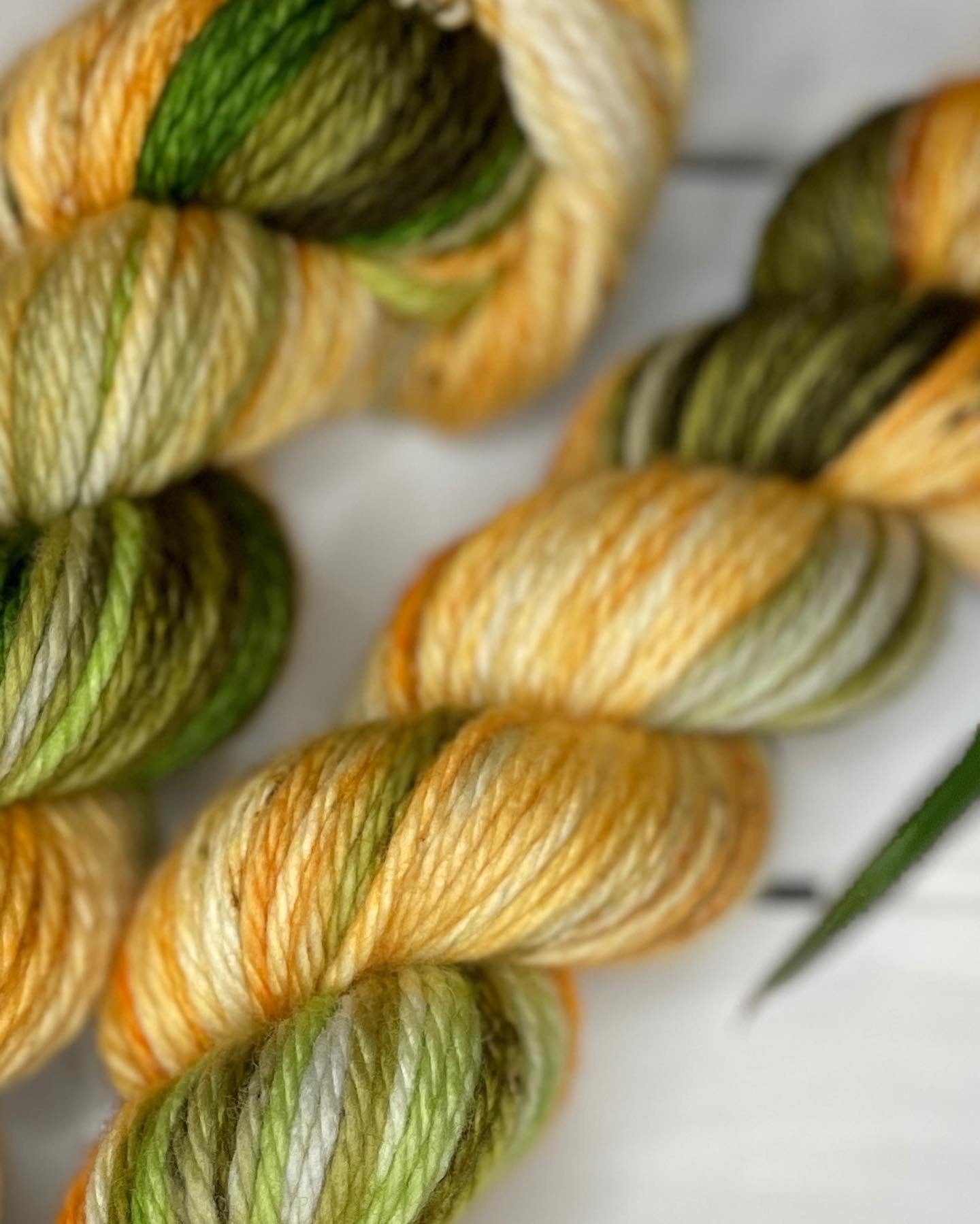 Mountain Meadows, bulky green and golden 100%superwash merino handdyed wool