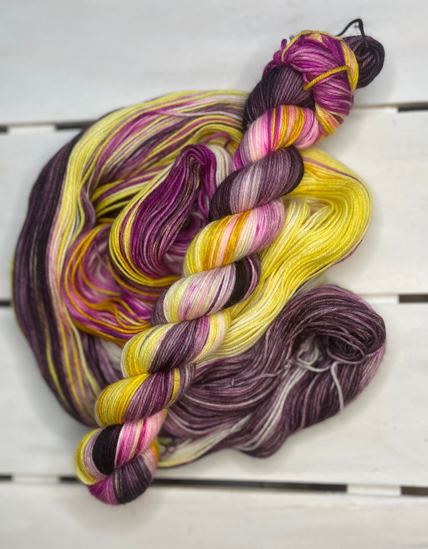 Purple Sun Daisy, fingering, Purple, yellow, pink, superwash merino wool