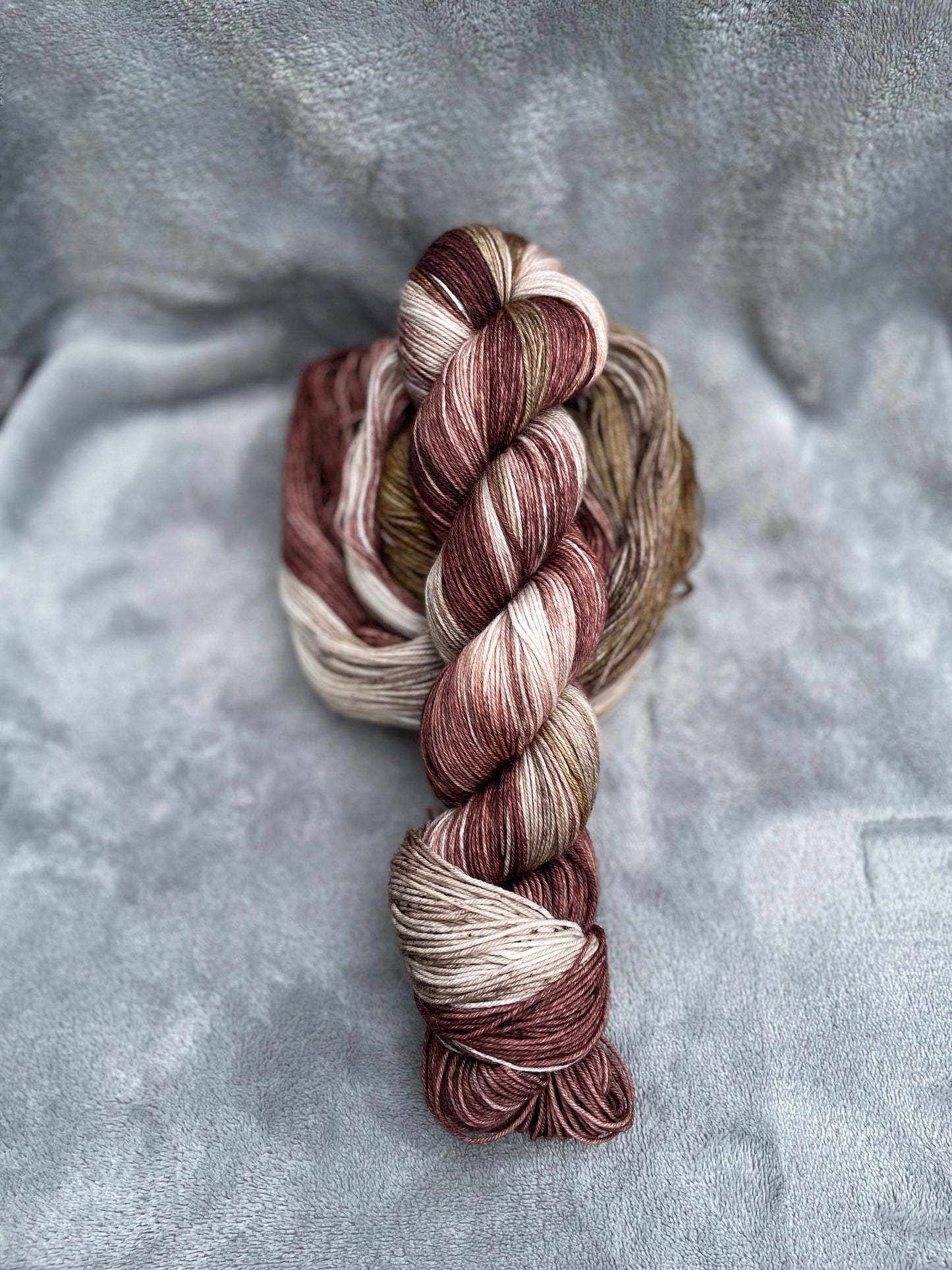 Puddle of Pooches, brown, tan, beige superwash merino wool